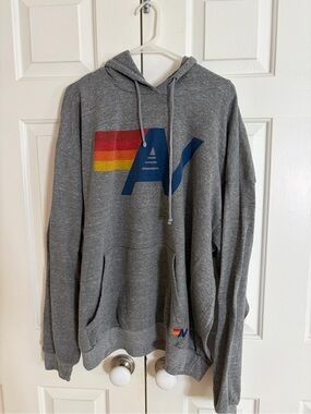Aviator Nation Gray Pullover Hoodie with Rainbow Stripe and Navy 'A' Logo